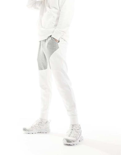 Unstoppable - Pantalon de jogging en molleton color block - et blanc - Under Armour - Modalova