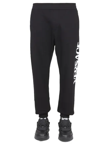 Versace jogging pants with logo - versace - Modalova