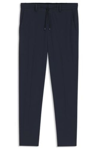 Pantalon Slim en tissu stretch performant - Boss - Modalova