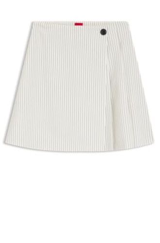 Jupe courte portefeuille en rayures tennis - HUGO - Modalova