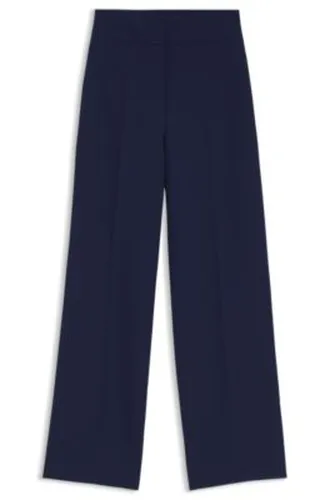 Pantalon large en tissu stretch - HUGO - Modalova