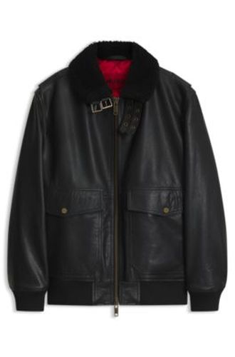 Veste en cuir matelassée avec détails en peau lainée - HUGO - Modalova