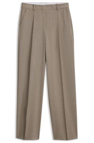 Pantalon Regular à jambes larges en laine vierge à rayures tennis - Boss - Modalova