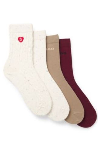 Lot de quatre paires de chaussettes business à motifs variés - HUGO - Modalova