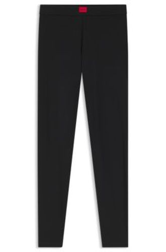 Legging Slim avec étiquette logo tissée rouge - HUGO - Modalova