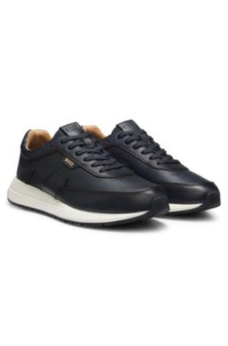 Baskets en cuir brossé avec semelle en gomme EVA - Boss - Modalova