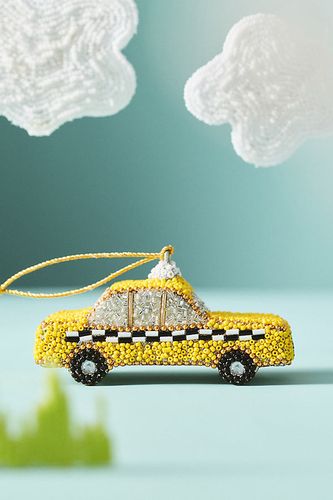 Ornement de voyage perlé en Yellow chez - Anthropologie - Modalova