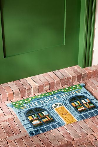 Paillasson imprimé en fibre de coco Book Shop en Blue taille: 18" x30" chez - Anthropologie - Modalova