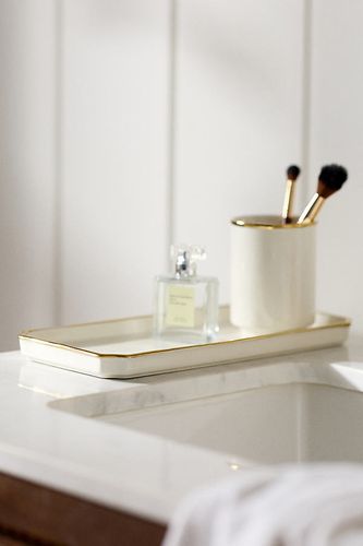 Plateau de bain en céramique Piper à bordures contrastantes en Gold chez - Anthropologie - Modalova