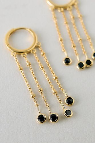 Boucles d'oreilles créoles huggie à multiples pendentifs plaquées or par en - By Anthropologie - Modalova