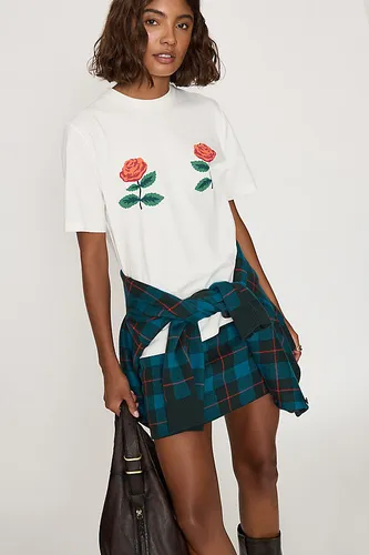 T-shirt graphique roses en taille: XS chez Anthropologie - The Tiny Big Sister - Modalova