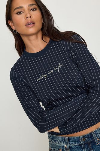 Haut à manches longues à rayures fines en taille: XS chez Anthropologie - Never Fully Dressed - Modalova