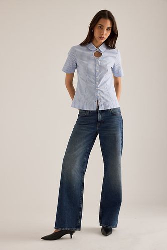 Jean The Saturday à jambe droite et taille basse en , taille: 25 chez Anthropologie - FRAME - Modalova