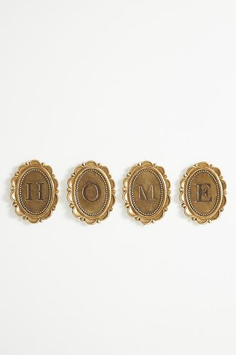 Charme mural de galerie monogramme Louisa chez - Anthropologie - Modalova