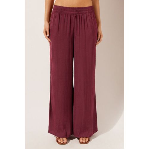 Pantalon palazzo brillant Taille L - Calzedonia - Modalova