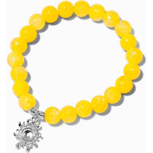 Bracelet élastique perlé breloque soleil - Claire's - Modalova