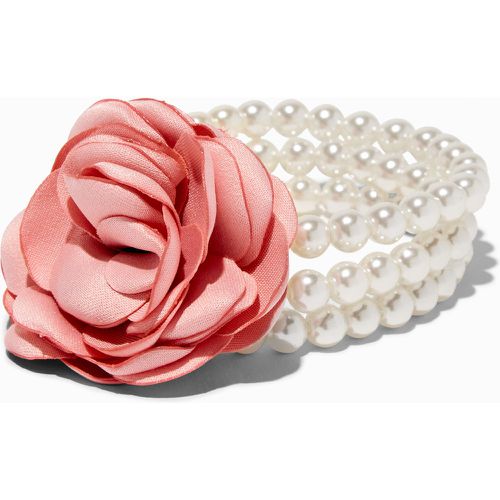 Bracelet élastique multi-rangs perles d’imitation et petit bouquet de rosettes - Claire's - Modalova