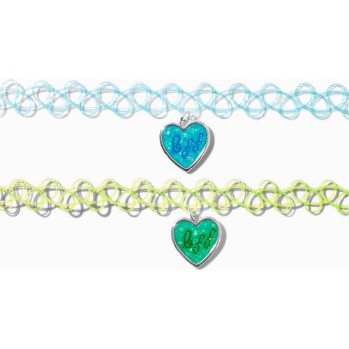 Ras-de-cou effet tatouage pendentif cœur « BFF » phosphorescents best friends - Lot de 2 - Claire's - Modalova