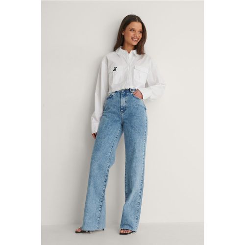 Jean droit à ourlet brut - Blue - NA-KD Trend - Modalova