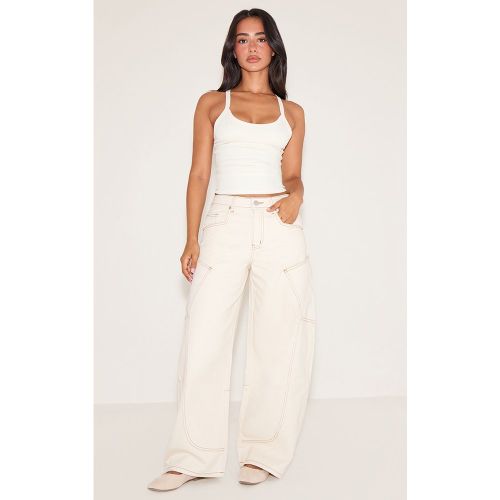 Petite Jean large écru à poches sur les côtés | Taille 30 - PrettyLittleThing - Modalova