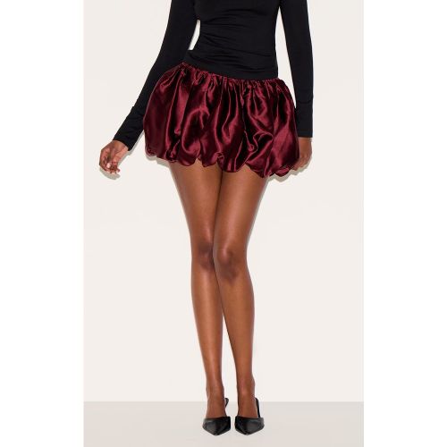 Mini-jupe bouffante satinée à taille élastique - PrettyLittleThing - Modalova