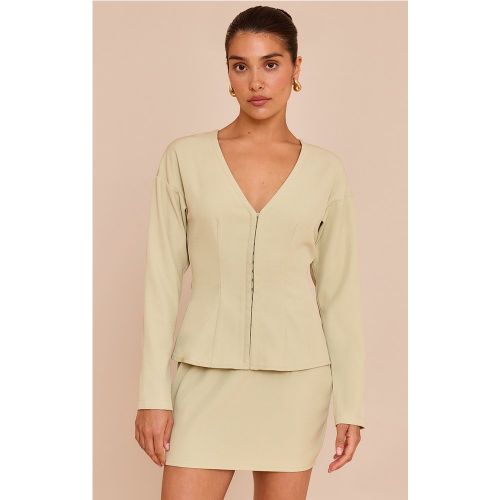 Petite Top long doux vert olive sans col à taille cintrée et agrafes et oeillets | Taille 30 - PrettyLittleThing - Modalova