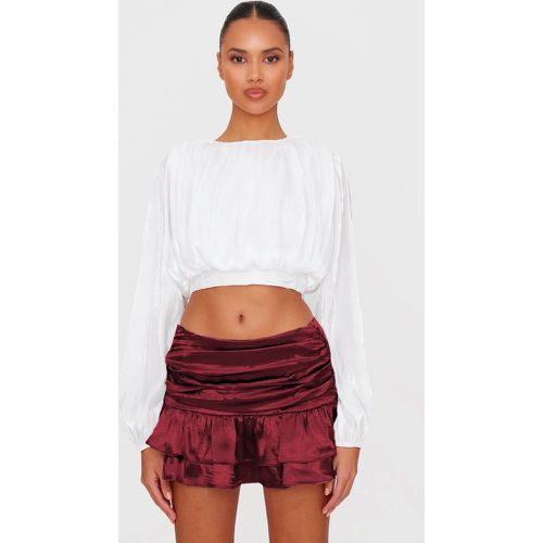 Mini-jupe satinée à taille tombante et volants - PrettyLittleThing - Modalova