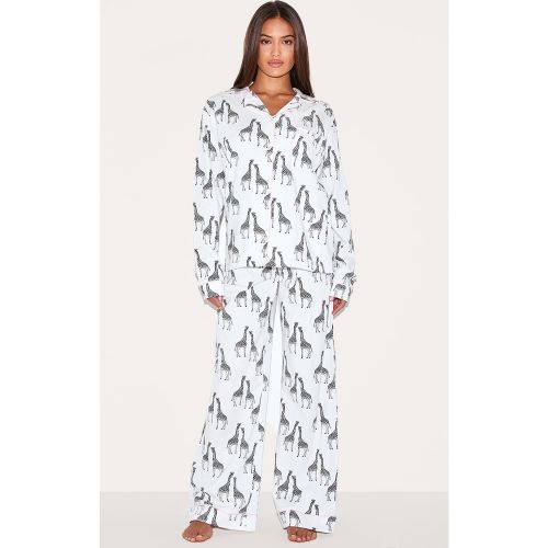 Ensemble de pyjama long en jersey imprimé giraffes à lisérés contrastants - PrettyLittleThing - Modalova