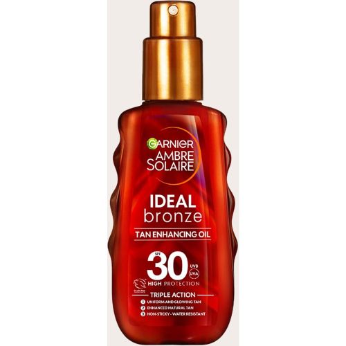 Garnier Huile solaire protectrice Ambre Solaire Ideal Bronze FPS 30 150ml - PrettyLittleThing - Modalova