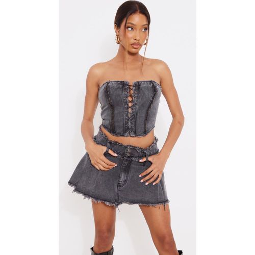 Top corset en jean élimé à lacets devant - PrettyLittleThing - Modalova