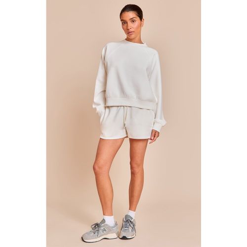 Petite Short en sweat à taille élastique - PrettyLittleThing - Modalova