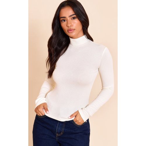 Petite Top ajusté doux côtelé à col montant et manches longues | Taille 42 - PrettyLittleThing - Modalova
