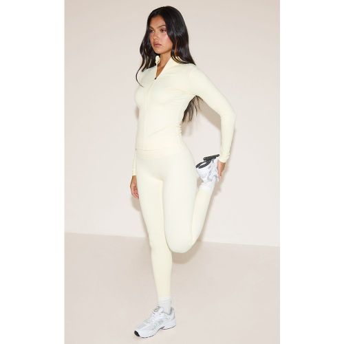 Pantalon de yoga ultime flare en Sculpt crème au beurre - PrettyLittleThing - Modalova