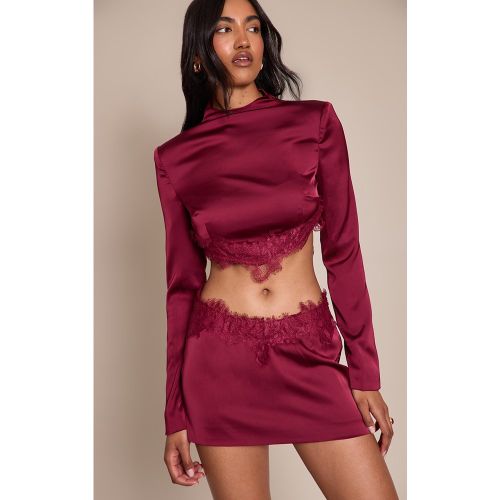 Top manches longues satiné à col montant et bordure en dentelle | Taille 38 - PrettyLittleThing - Modalova