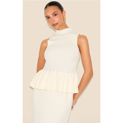 Petite Top long en maille tricot à col montant et ourlet péplum - PrettyLittleThing - Modalova