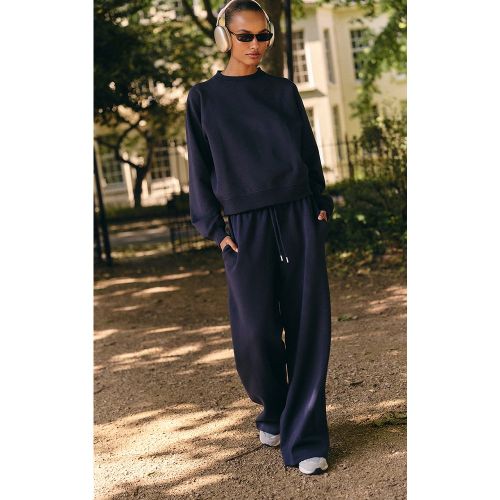 Jogging large doublé à logo brodé - PrettyLittleThing - Modalova