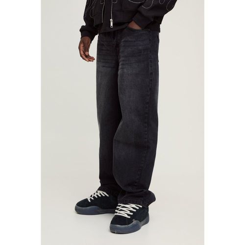 Jean large délavé en noir délavé - 28S - Boohooman - Modalova