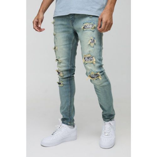 Jean skinny délavé déchiré et réparé - 32R - Boohooman - Modalova