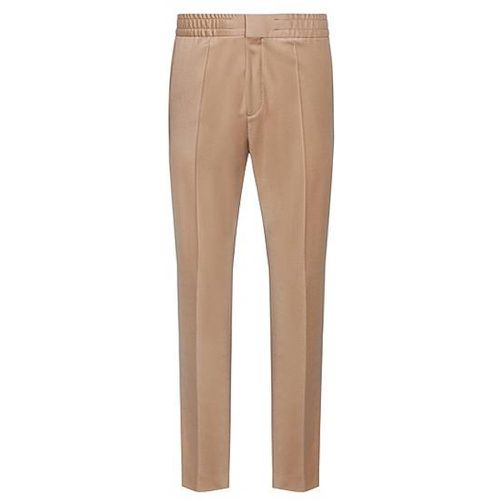 Pantalon Extra Slim Fit en laine vierge stretch - HUGO - Modalova