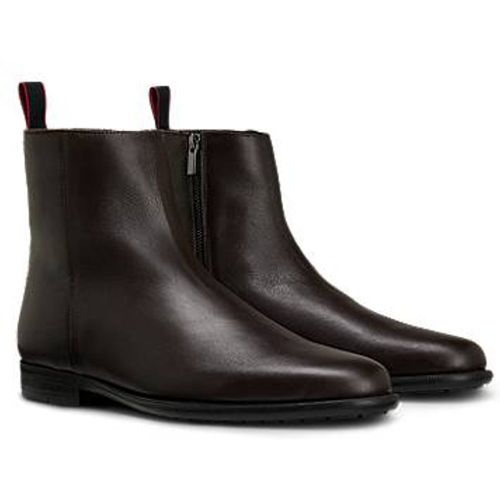 Bottines en cuir grainé à logo embossé - HUGO - Modalova
