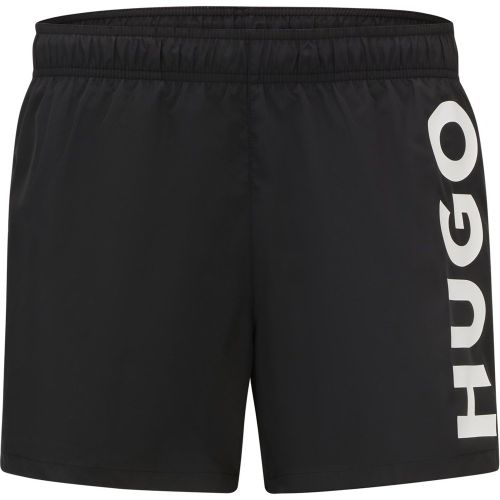 Short de bain à séchage rapide et logo imprimé vertical - HUGO - Modalova