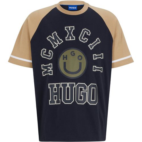 T-shirt ample en jersey de coton avec motif artistique de la saison - HUGO - Modalova