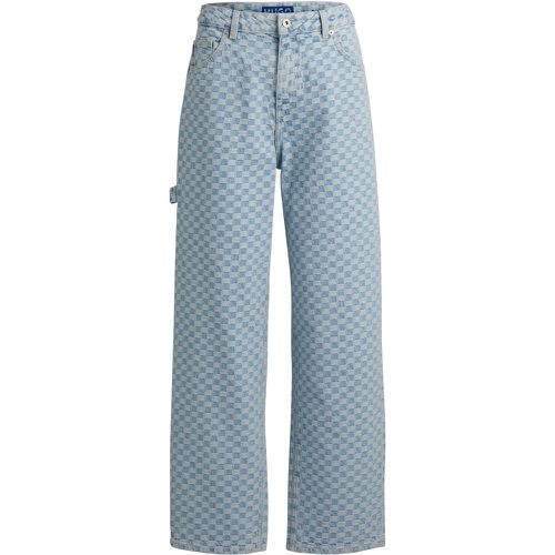 Jean Baggy en denim rigide à motif damier - HUGO - Modalova