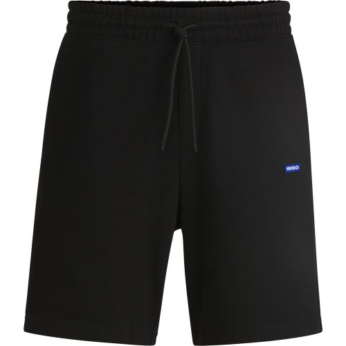 Short en molleton de coton avec cordon de serrage et étiquette logotée bleue - HUGO - Modalova