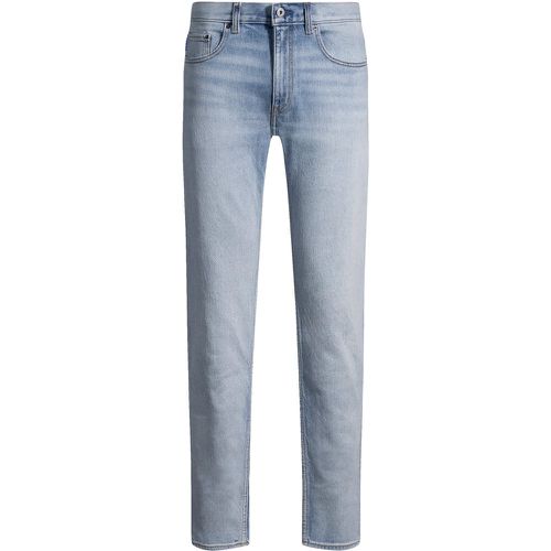 Jean Slim en denim bleu stone-washed - HUGO - Modalova