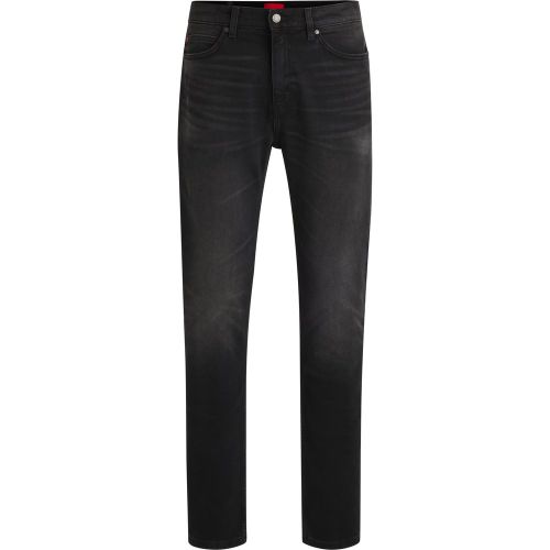 Jean Slim en denim stretch noir - HUGO - Modalova
