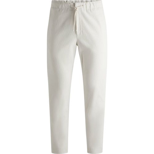 Pantalon Tapered en velours côtelé performant - Boss - Modalova