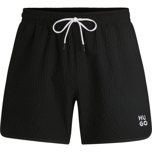 Short de bain à la structure gaufrée avec logo brodé revisité - HUGO - Modalova