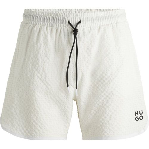 Short de bain à la structure gaufrée avec logo brodé revisité - HUGO - Modalova