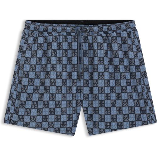 Short de bain à séchage rapide et imprimé à carreaux à logo empilé - HUGO - Modalova